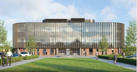 An artist's impression of a police headquarters building made of brick and glass. A lawn and trees lead up to the building.